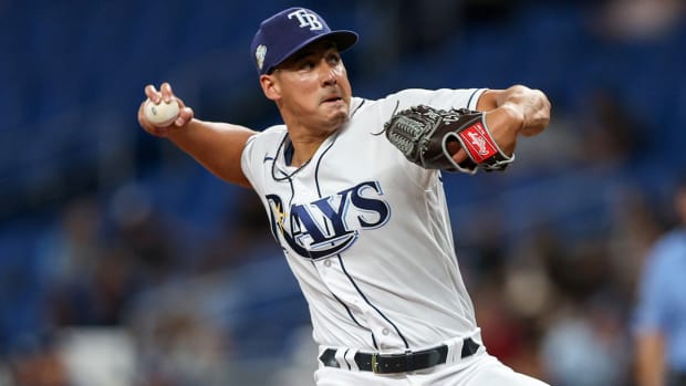 Rays pitcher Robert Stephenson throws a slider.